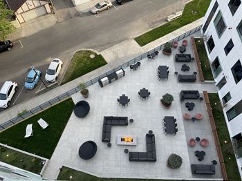 an aerial view of a parking lot with tables and chairs at Inspire West Town, CHICAGO, Illinois